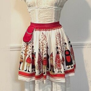 Vintage holiday apron look festive this holiday while baking treats and goodies